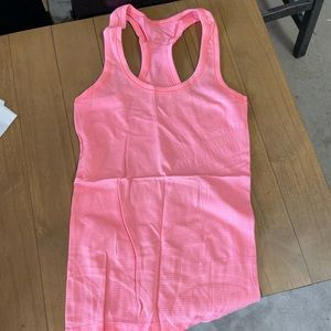 Coral lululemon racer back tank size 4